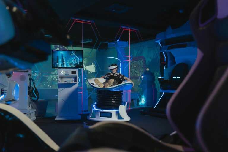 A young boy engaged in virtual reality gaming at an indoor arcade center.